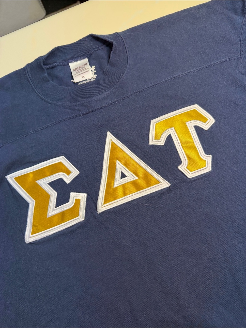 Navy Short-Sleeve Crewneck with Gold Lettering Sigma Delta Tau